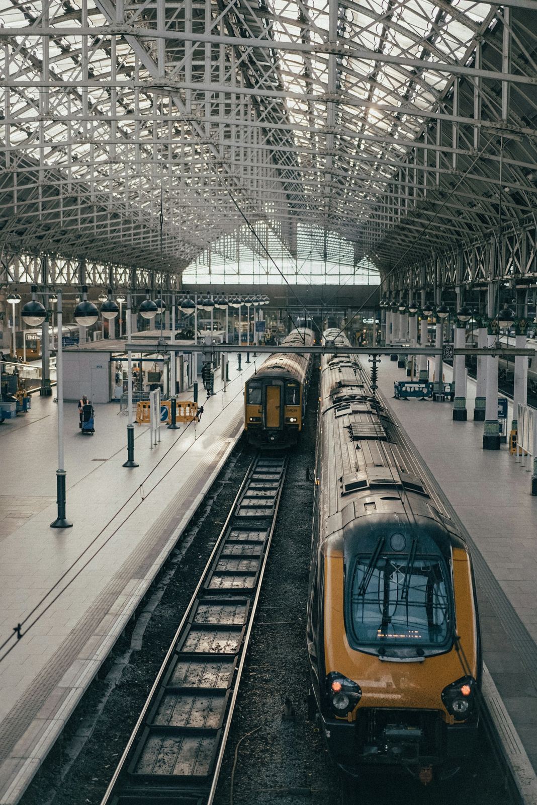 Railway platform with an arriving train